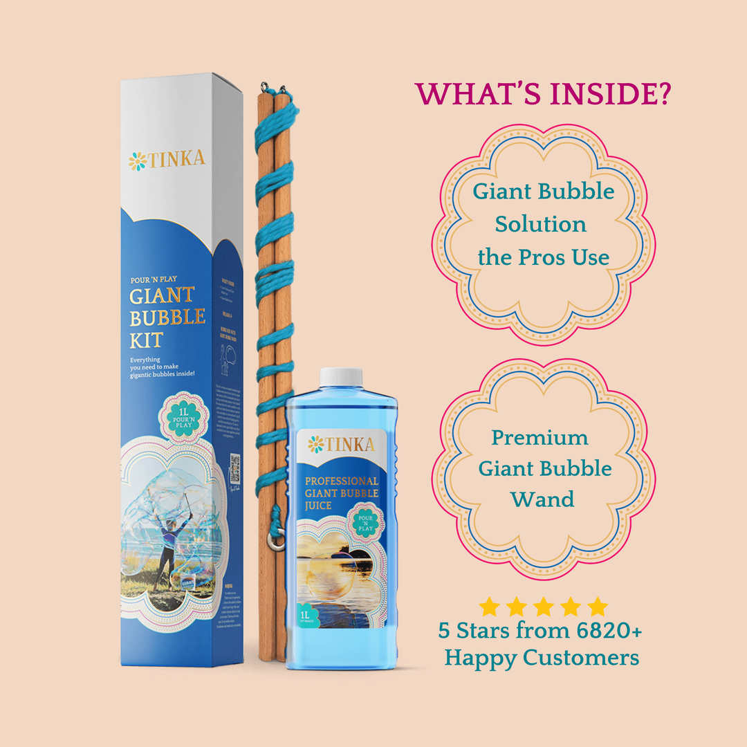 TINKA Giant Bubble Kit shown with its blue, white and gold retail box, a 1L blue bottle of bubble solution, and a bubble wand.