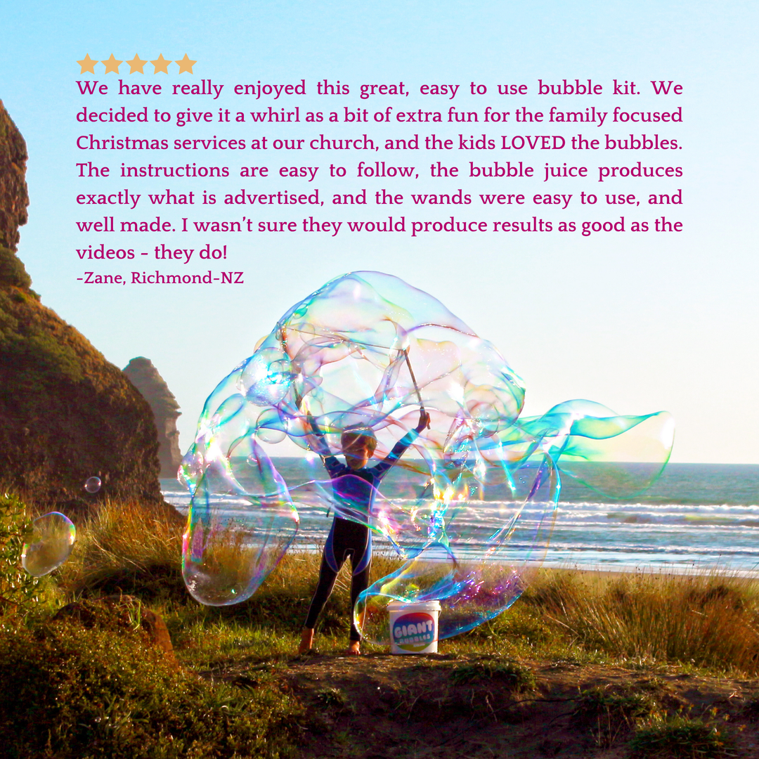  A child creating a giant bubble in a field next to a beach with a 5 star review overlay above.